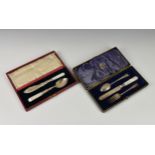 A cased Edwardian silver three piece travelling cutlery set, Levesley Brothers, Sheffield, 1902, the