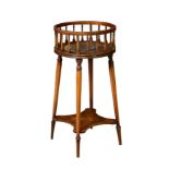 A late 19th century mahogany and marquetry basket-top jardiniere stand, the circular galleried top