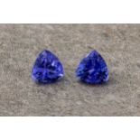 A pair of trillion cut Tanzanites, each measuring 6mm and of good, matching colouring.