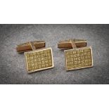 A pair of 18ct yellow gold cuff links, French hallmarks, the rectangular faces with basket weave