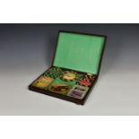 A rosewood gambling chip box with stained bone counters, the hinged box lid inlaid with 'BOSTON'