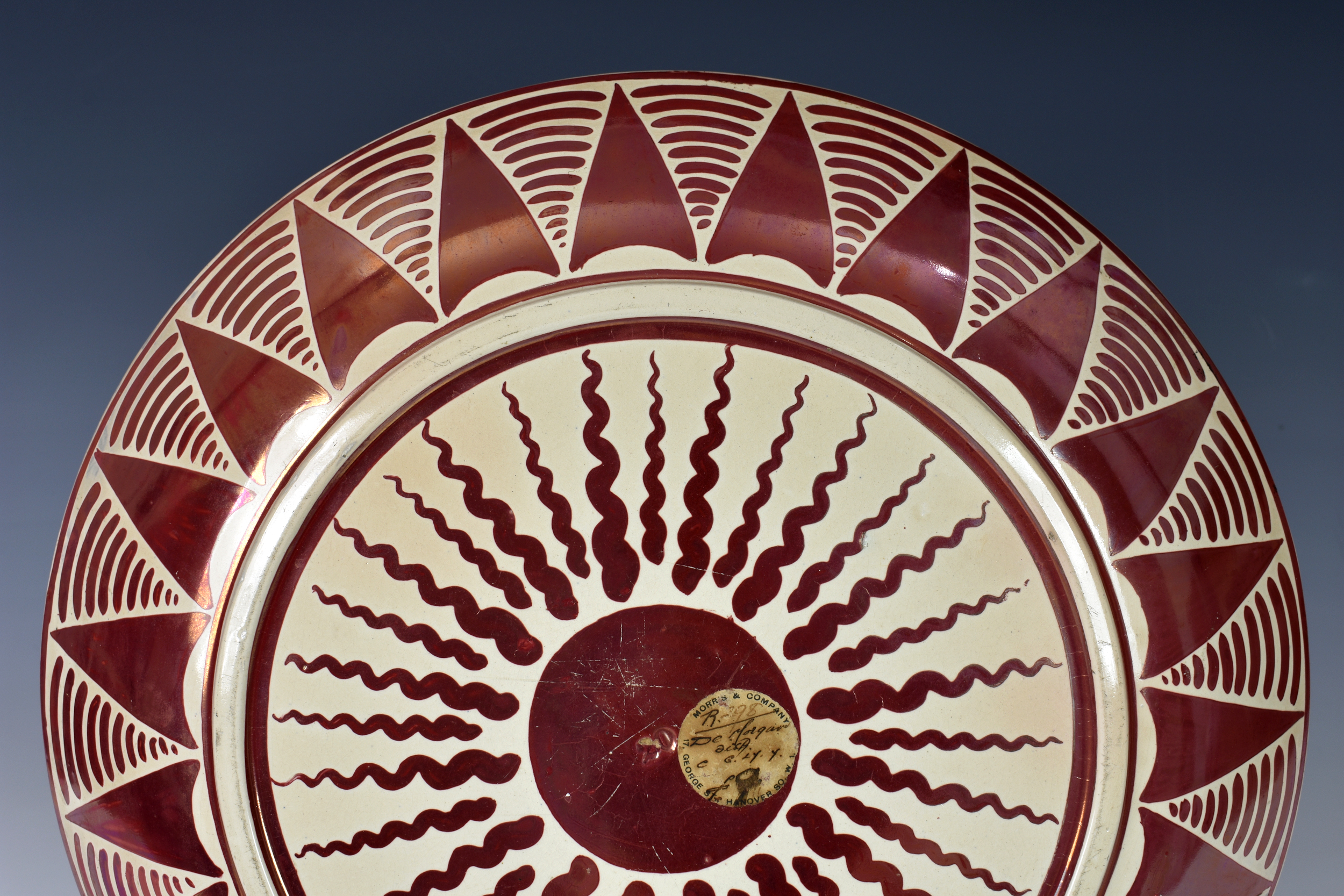 William De Morgan (1839-1917) - a ruby lustre shallow dish or charger, 1890s, painted with an - Image 10 of 11