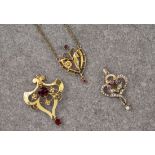 Three 9ct gold pendants, one set with decorative gold flowers and rubies, one set with rubies and
