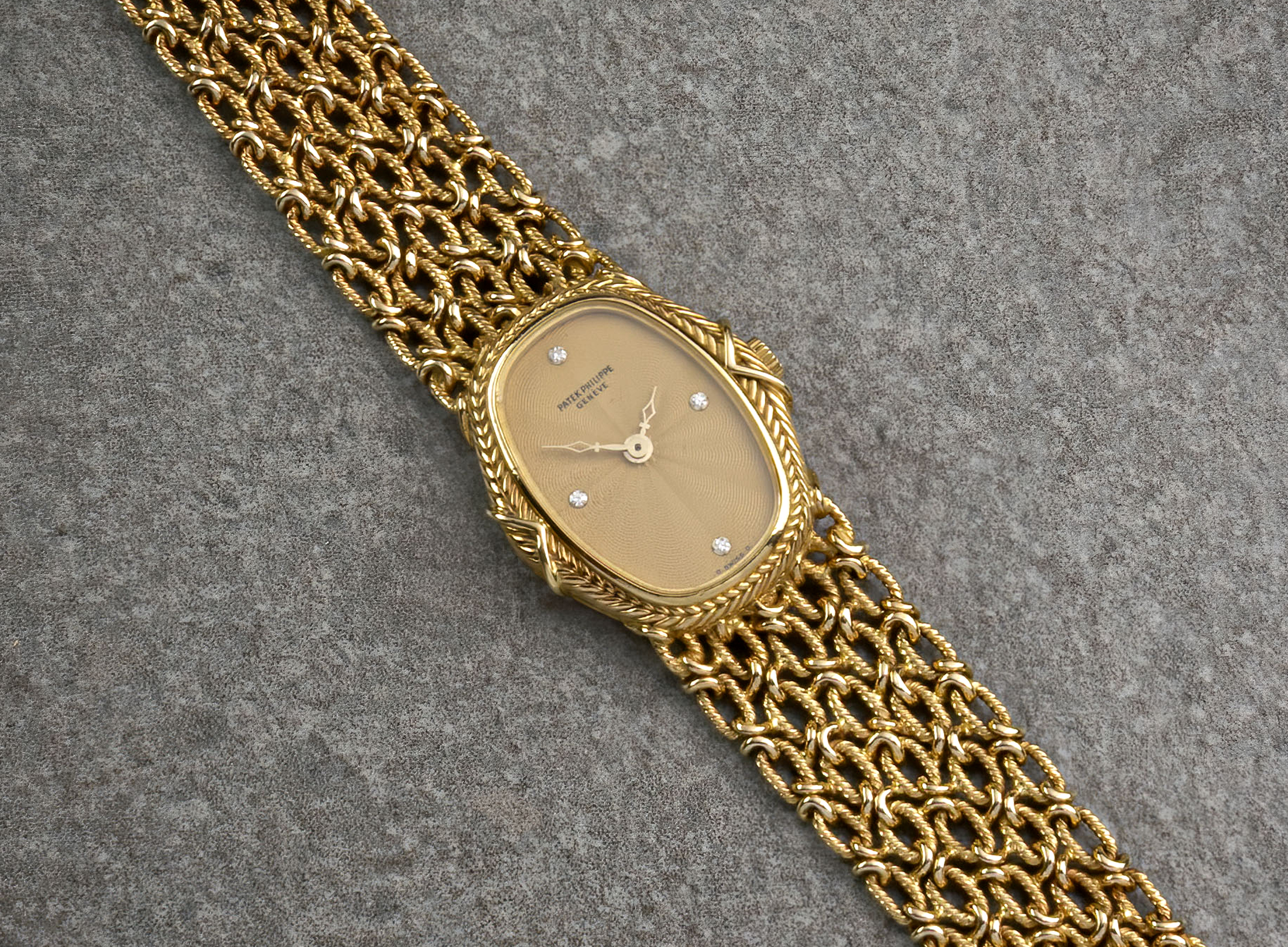 Patek Philippe - a ladies 18ct gold and diamond ladies wrist watch, Ref. 4505/1, Movement No.