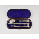 A cased Victorian silver Queens pattern three piece childs travel cutlery set, Hilliard &
