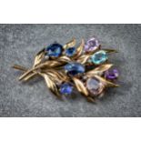 A mid-century Continental 9ct gold and multi-gem brooch, in the form of a floral bouquet, set with