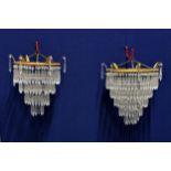 Two graduated bag style chandeliers, mid-century, with four tiers of graduated icicle drops,