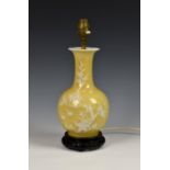 A Chinese yellow glazed porcelain bottle vase, probably early 20th century, later converted to a