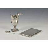 A George III silver helmet form cream jug, Peter & Ann Bateman, London, 1793, of typical form with