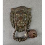 A late 18th / 19th century bronze Lion Mask door knocker, realistically cast with shaped loop handle