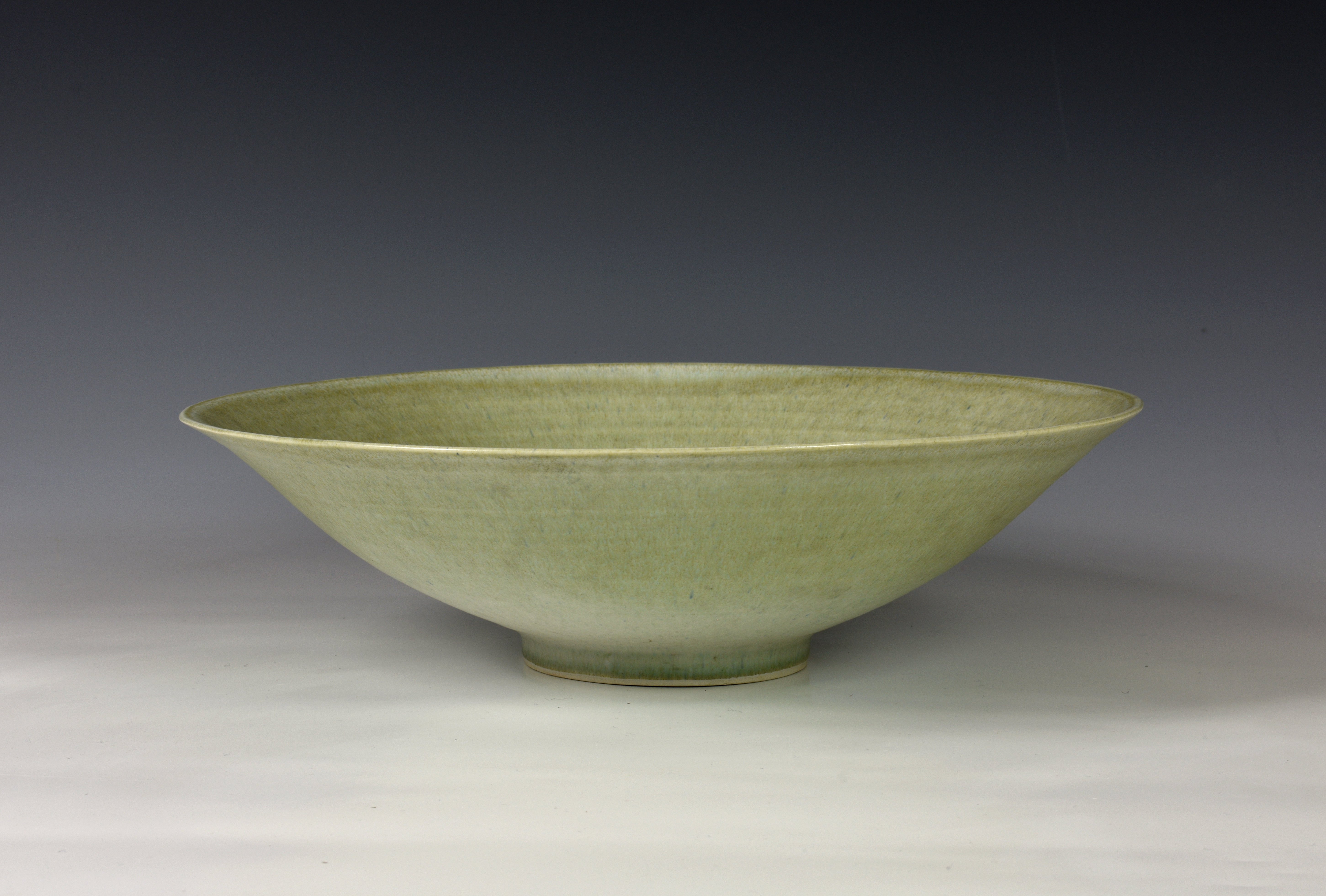 Alan Spencer-Green (1932-2003) - a studio pottery bowl, a speckled / mottled green and brownish