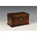 A George III Anglo-Chinese padouk wood tea caddy, of sarcophagus form, the hinged lid with ornate