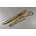 A late 18th or early 19th century brass wall-mounted cylindrical taper/spill holder, 12¼in. (31.