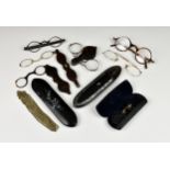 A small collection of antique eyewear, comprising of two pairs of yellow metal pince-nez, two