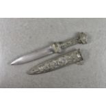 A Victorian cast silver plate dagger and scabbard, later broad double-edged blade, the silver