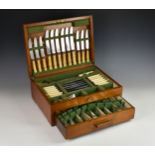 An oak cased canteen of silver plated Old English pattern cutlery, for twelve settings by Harrison