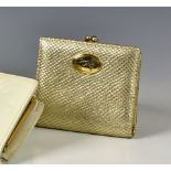 A Vivienne Westwood leather purse, in soft, satin gold leather with cream leather interior, with