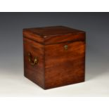 A 19th century four division mahogany decanter box, having brass side carrying handles, the hinged