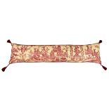 A long sofa cushion, in pink toile-de-joie fabric with tasselled corners, 64½in. (164cm.) long.