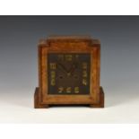 A 1930s Art Deco oak cased mantel clock, the eight day Hamburg American Clock Co. movement