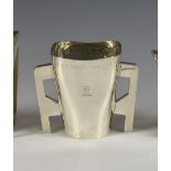 A late Victorian Irish silver mether cup, Johnson Ltd, Dublin, 1900, of tapering square form with