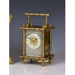 A large French gilt brass bamboo cased carriage clock, late 19th century, the foliate engraved,