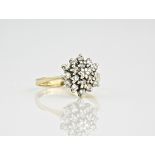 A 9ct yellow gold and diamond cluster ring,