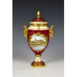 A limited edition Coalport Fine Bone China Limited commemorative Madeley Court urn shaped vase and