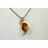 A Catherine Best 18ct yellow gold, citrine and diamond pendant, set with a mixed pear cut citrine
