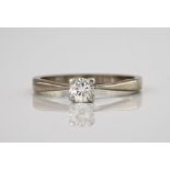 An 18ct white gold and diamond single stone ring, the brilliant cut diamond measuring