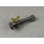 Antique Gun accessory - An early 19th century iron main spring clamp from a cased long gun set, of