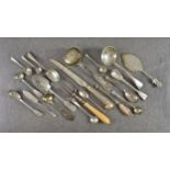 A collection of silver cutlery, comprising a Kings pattern sifter spoon by Josiah Williams & Co.,
