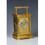 A large 19th century French gilt brass repeating carriage clock, possibly by Couaillet of Saint-