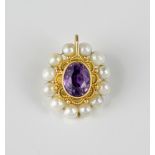 A Victorian style yellow gold, amethyst and pearl pendant, the double sided pendant with a central