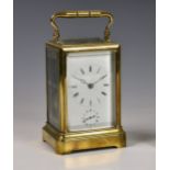 A brass cased carriage with alarm, early 20th century, corniche case, white Roman enamel dial with