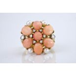 An 18ct yellow gold, coral, pearl & diamond cluster ring, featuring seven oval coral cabochon