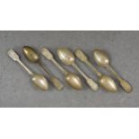 A matched set of six silver shooting prize fiddle pattern teaspoons, John Round & Sons Ltd. & Joseph