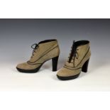 A pair of Tods ladies suede ankle boots, in pale grey-brown, with high heel and black piping, UK