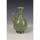 A Chinese carved celadon glazed ewer or jug, in the Longquan style, probably 19th / early 20th