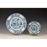 An 18th century Chinese blue and white export porcelain charger, painted with three precious objects