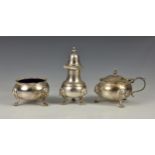 A three piece Elizabeth II silver condiment set in an earlier style, David Shaw Silverware Ltd,