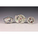 A Cantonese porcelain famille rose leaf shaped dish, of typical form, painted in polychrome enamels,