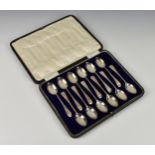 A cased set of twelve George V silver Old English pattern teaspoons, James Dixon & Sons Ltd,