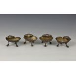 A set of four Victorian silver salts, George Unite, Birmingham 1863, of intricate scallop shell
