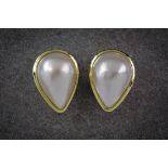 A pair of 14ct gold and Mabé pearl earrings, the pear shaped pearls measuring 22 x 15.5mm., the stud