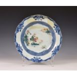 A late 17th / 18th century Chinese famille verte porcelain shallow dish, the shaped rim and sides of