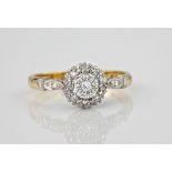 A mid-century style 18ct gold and diamond cluster ring, the central illusion set eight cut diamond