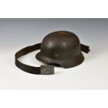 A German Nazi M42 pattern helmet, with metal head band, together with a WWII Third Reich Nazi German