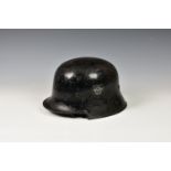 A German Model 1934 Fire Police Double Decal Helmet, satin black finish, some inner workings