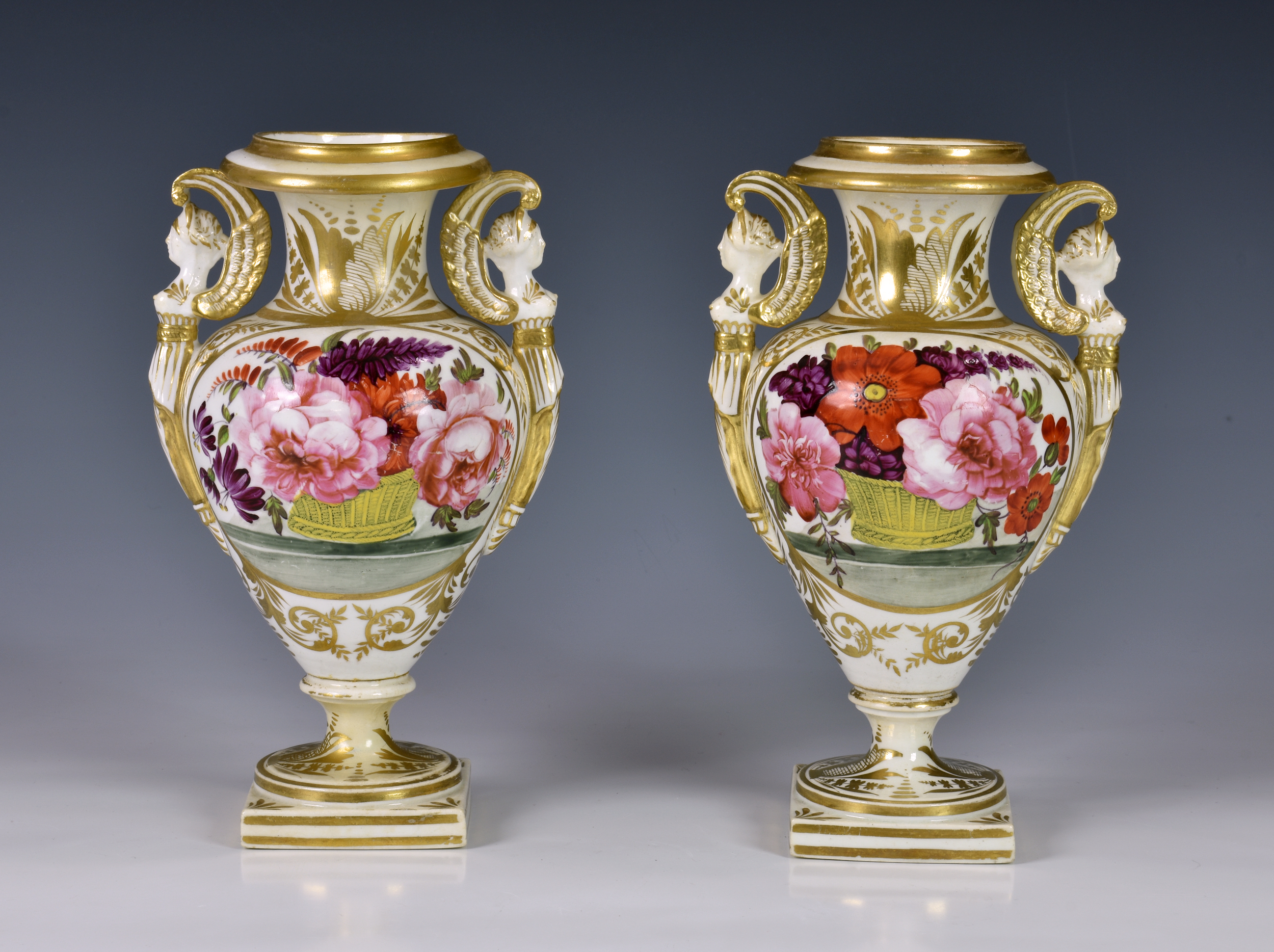 A pair of 19th century English porcelain vases, probably Spode, of classical urn form, with twin